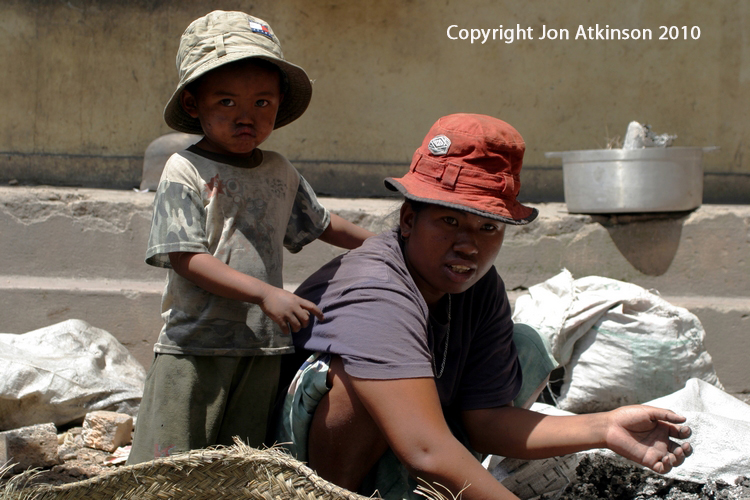 Mother and son, recycling Aluminium in central Madagascar